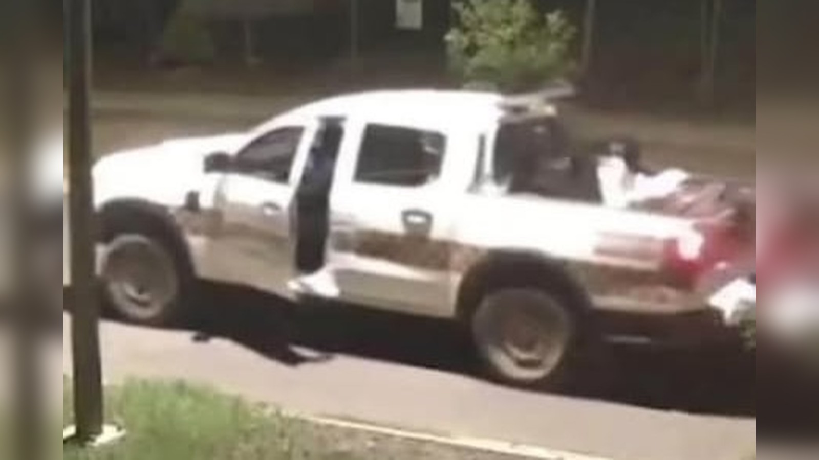 A white military pickup truck captured on security footage at RAAF Base Darwin