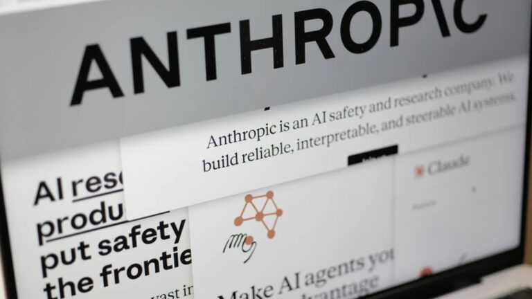 Close-up view of a laptop screen displaying the Anthropic company website and logo