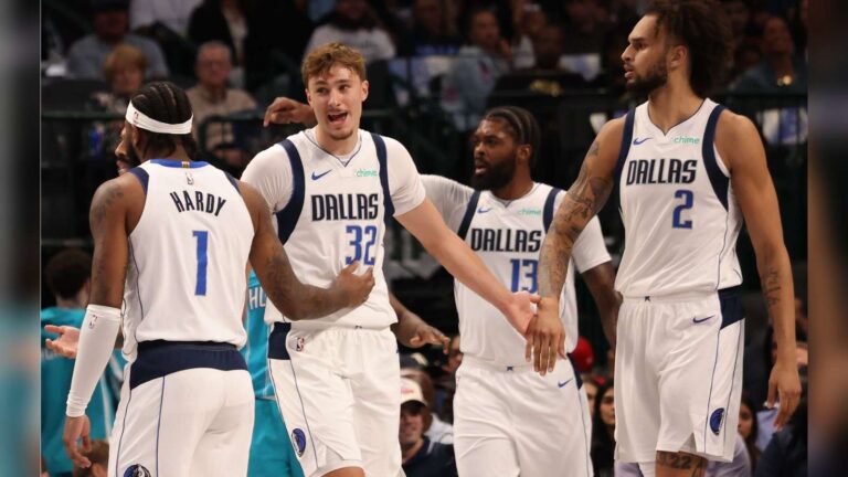Dallas Mavericks basketball players Jaden Hardy and teammates on court during preseason game