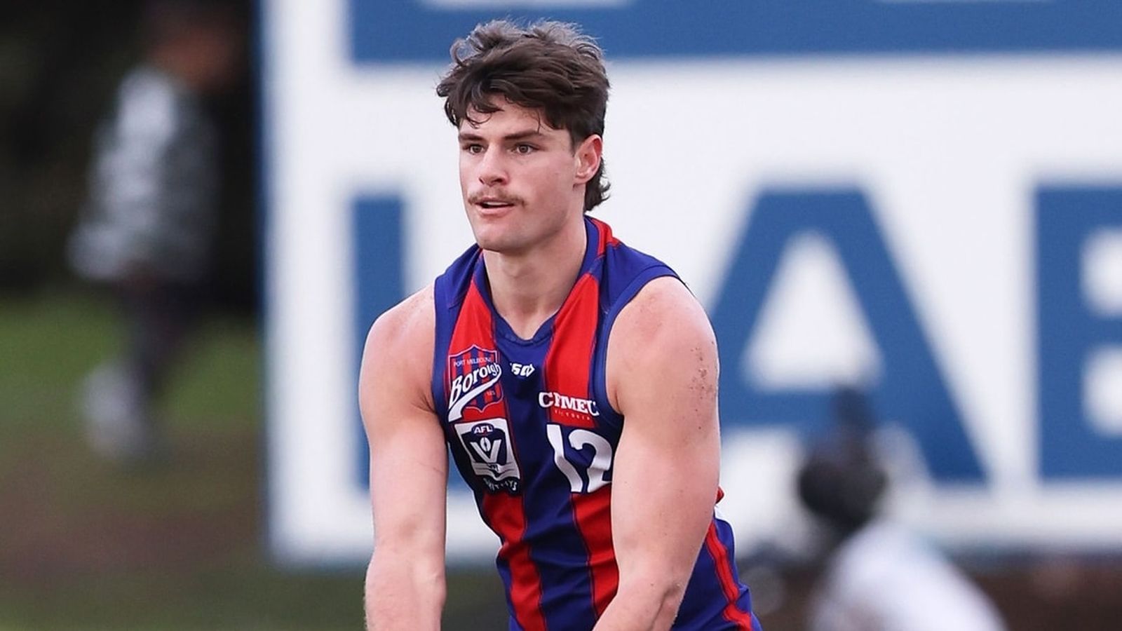 Dominic Bedendo wearing a VFL team guernsey on the field during a match