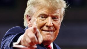 Donald Trump pointing forward while speaking at a campaign rally in Georgia