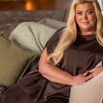 Gemma Collins sitting comfortably on a sofa with cushions during her documentary project interview