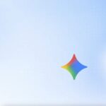 Colorful Google Gemini AI spark logo against a light blue gradient background
