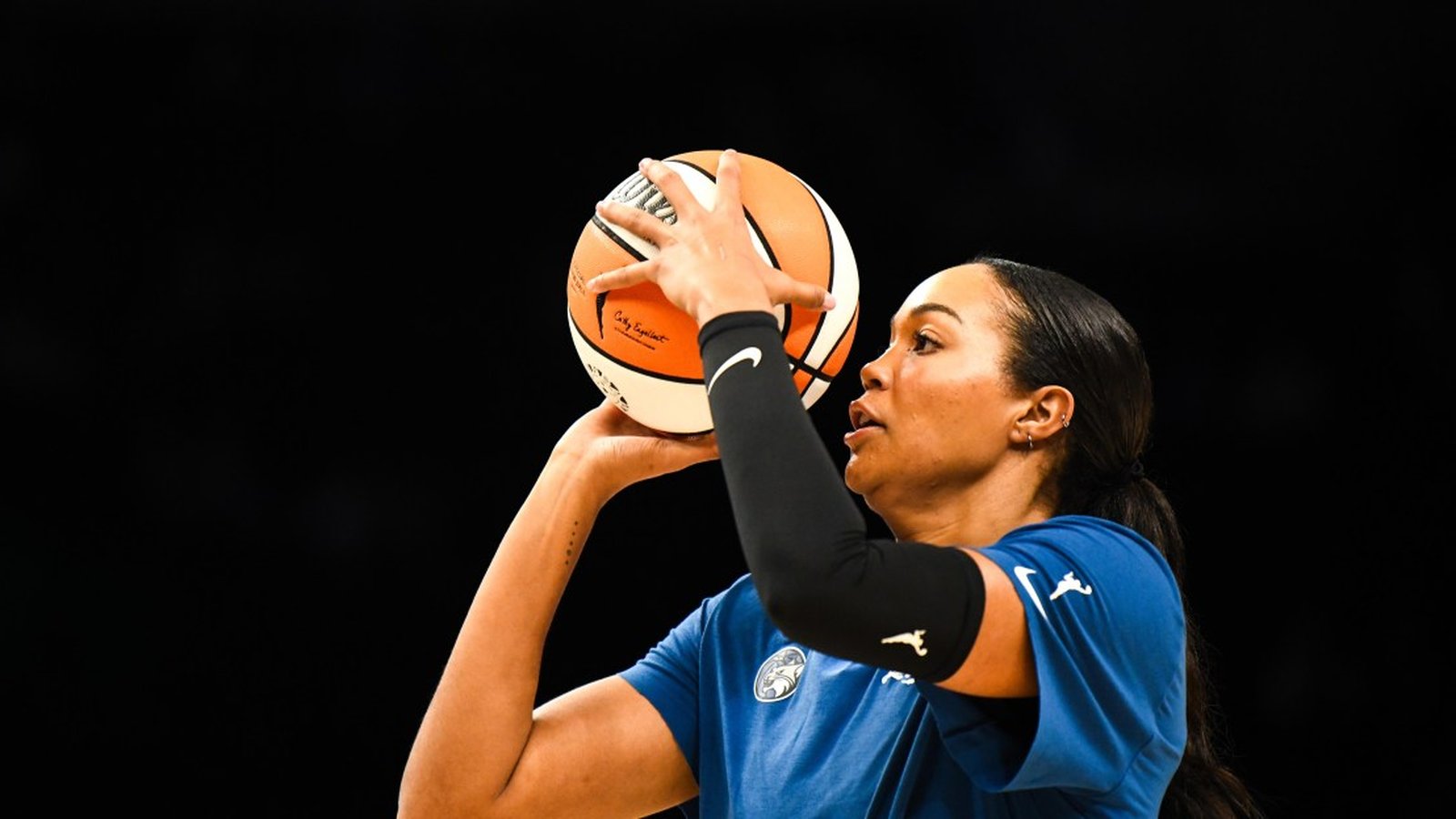 Minnesota Lynx star Napheesa Collier shooting a basketball during a professional game