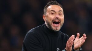 Tottenham manager Roberto De Zerbi shouting instructions and clapping on the sidelines during a matc