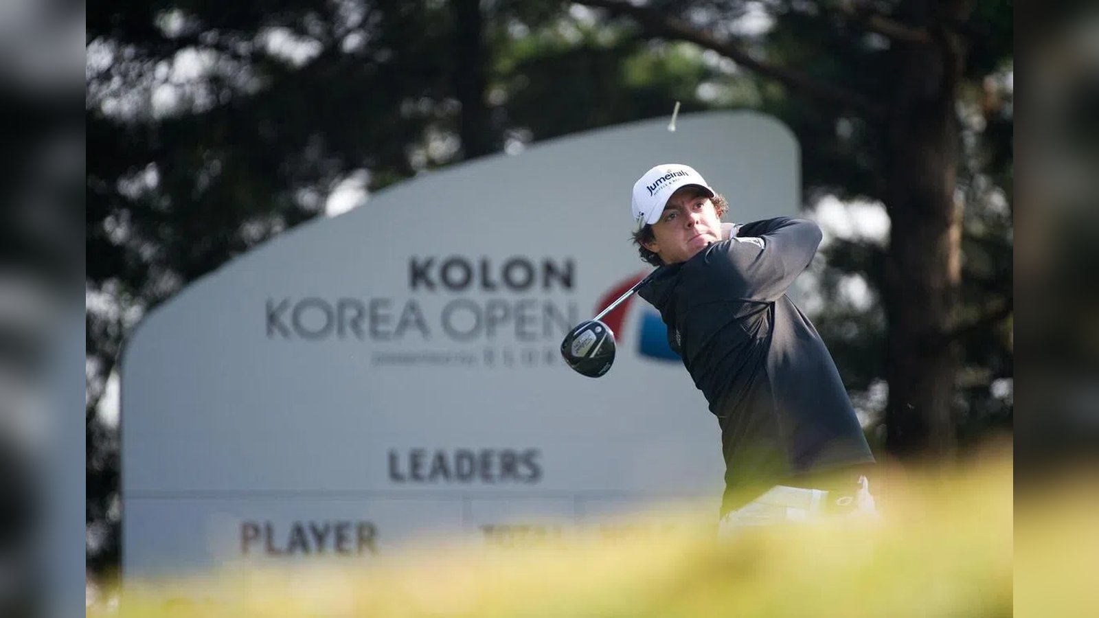Professional golfer Rory McIlroy swinging his golf club during a tournament