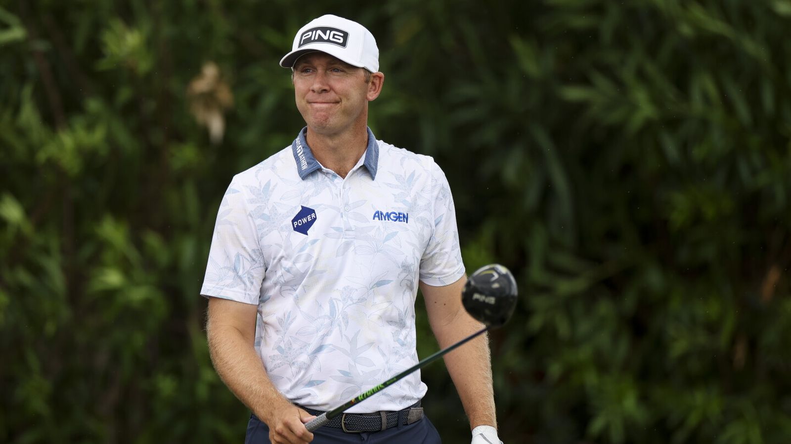 Professional golfer Seamus Power wearing a white patterned shirt and Ping cap on course
