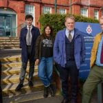 Five cast members standing outside a brick building for the BBC drama The Last Detectives