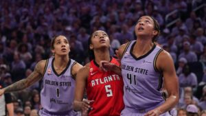 Basketball players from the Atlanta Dream and Golden State Valkyries competing during a WNBA Finals